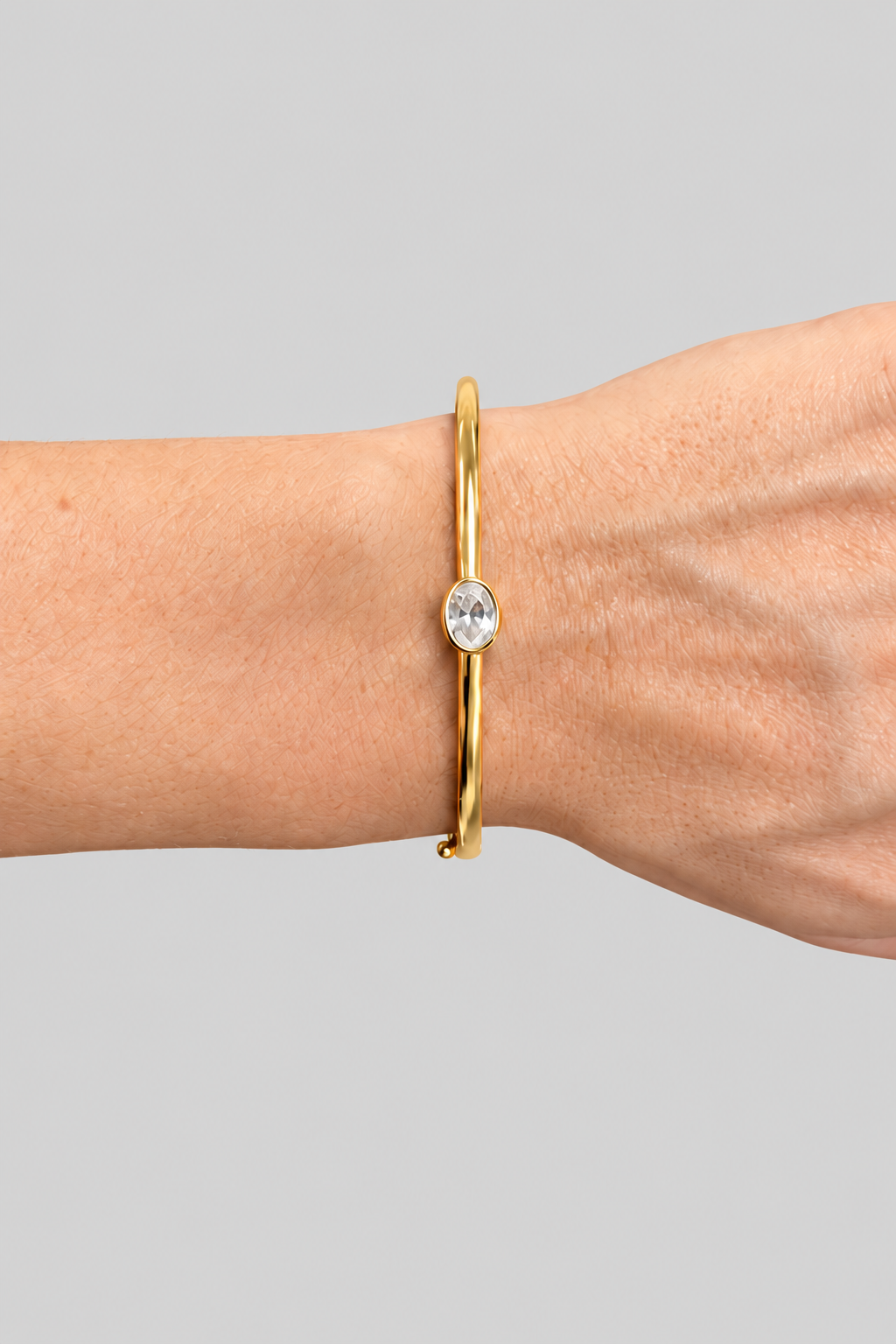 Drew Oval Cut Bezel Two-Tone Bangle on wrist